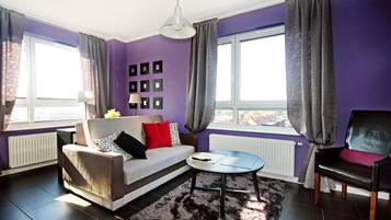 Deluxe-Apartment | Wohnzimmer | Fernseher