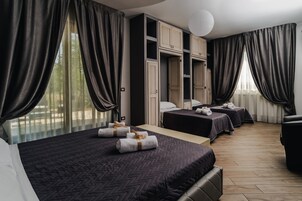 舒适客房 | 迷你吧、婴儿床、免费 WiFi、床单