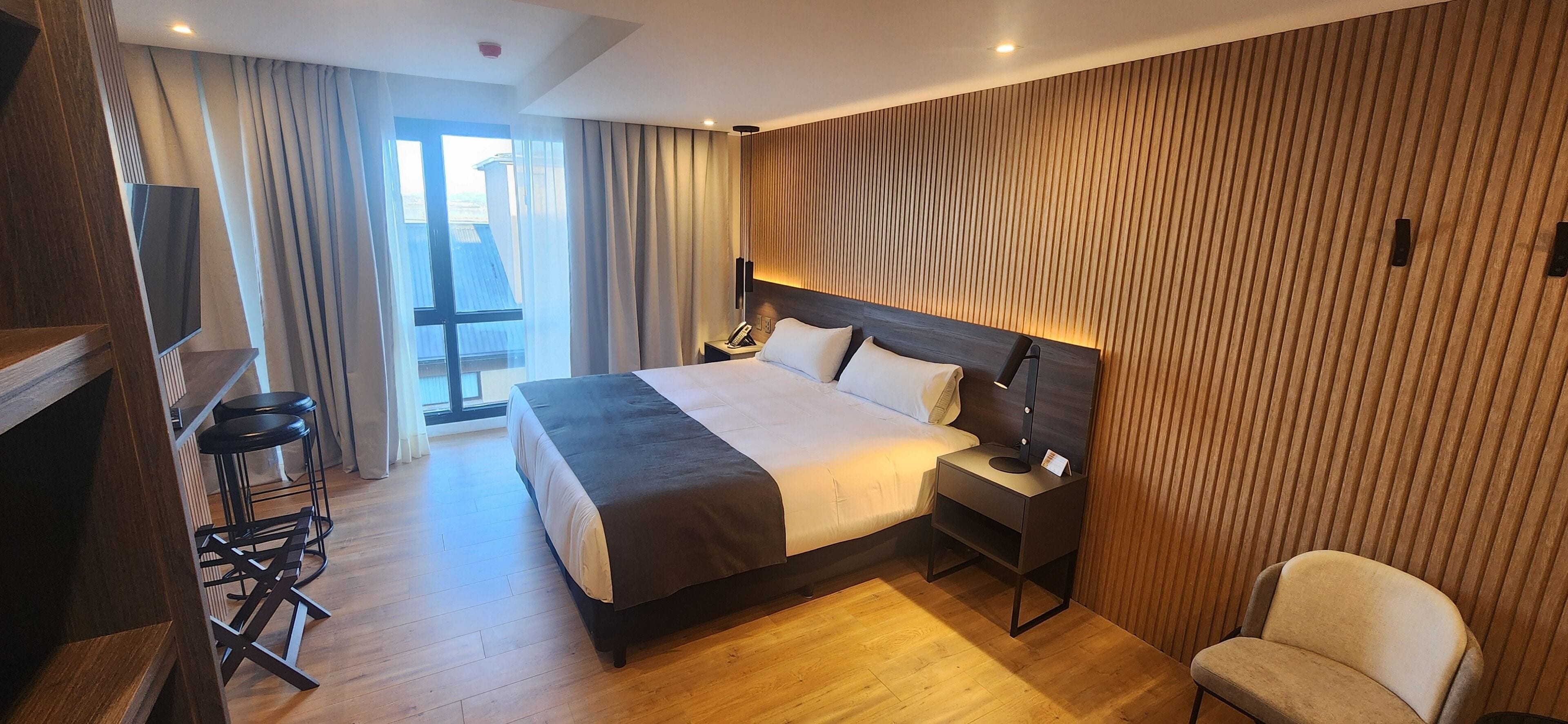 Suite estudio ejecutiva | Ropa de cama de alta calidad, colchones Select Comfort, minibar