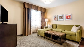 Premium bedding, desk, laptop workspace, blackout curtains