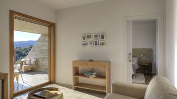 Family Room, Terrace, Mountain View | Minibar, desk, blackout drapes, soundproofing