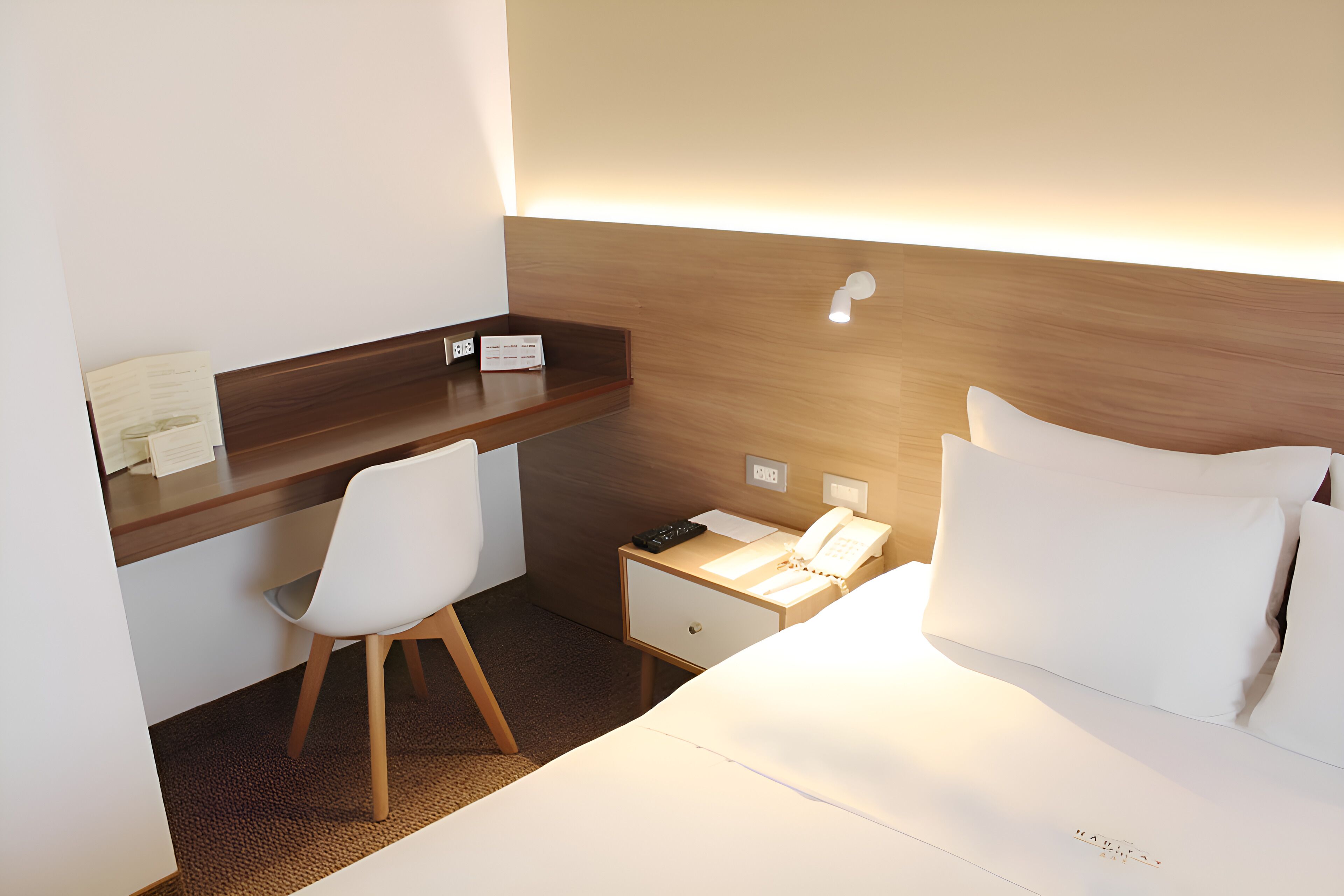 twin room | minibar, in-room safe, desk, laptop workspace