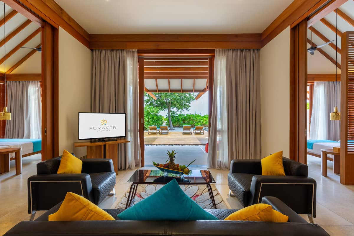 two bedrooms beach residence with pool | living area | 55-inch led tv with satellite channels, tv