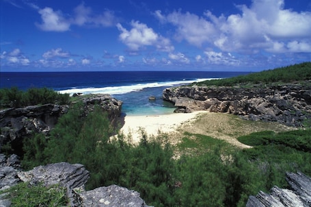 Beach. Le Flamboyant Hotel