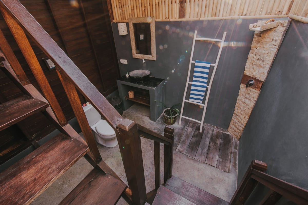 family huts | bathroom | shower, rainfall showerhead, hair dryer, towels