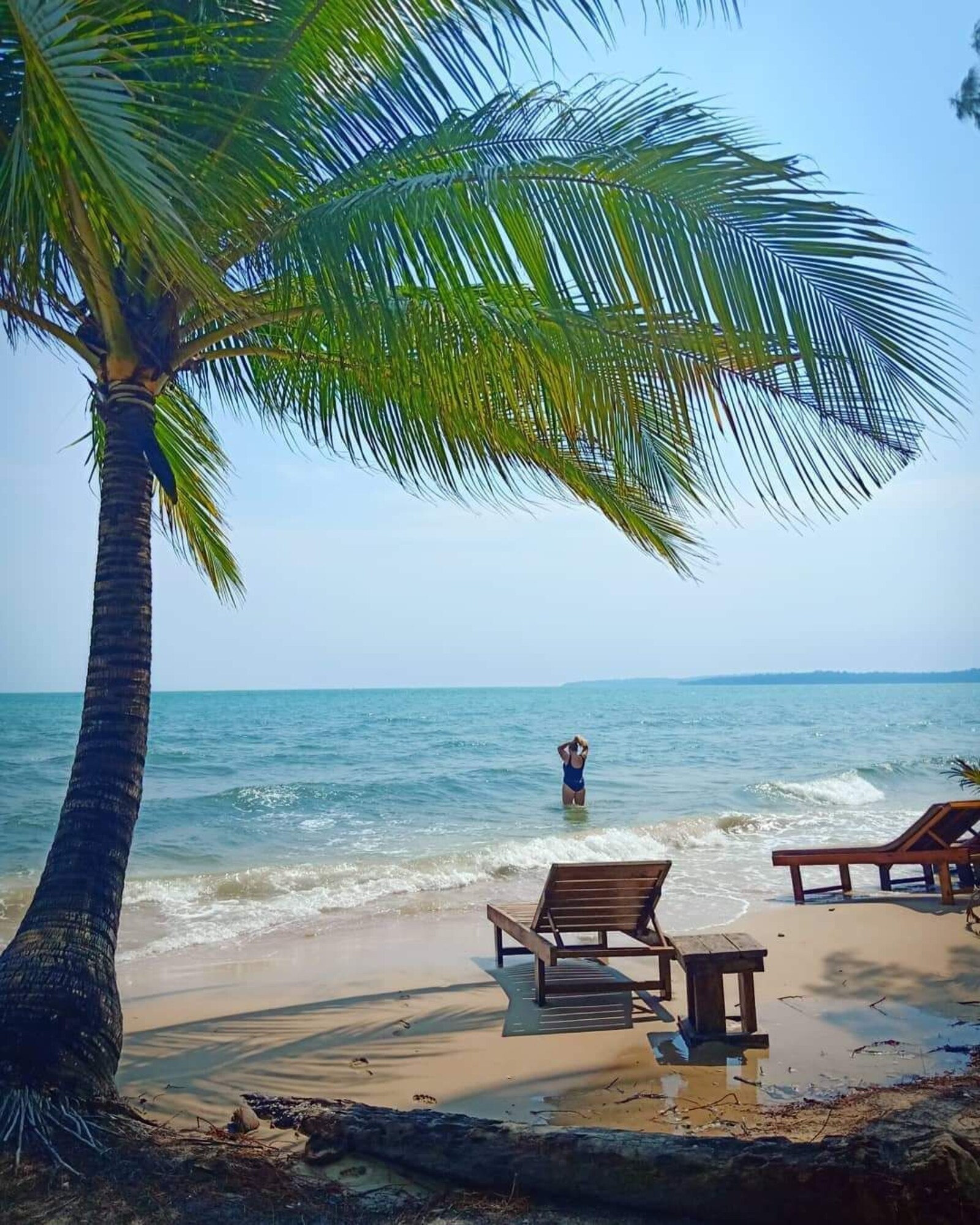 On the beach, sun-loungers, beach umbrellas, beach volleyball
