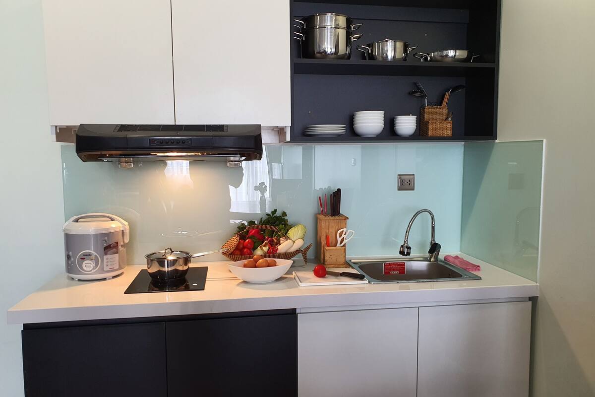 studio suite super king and bunk bed, balcony, garden view | in-room dining