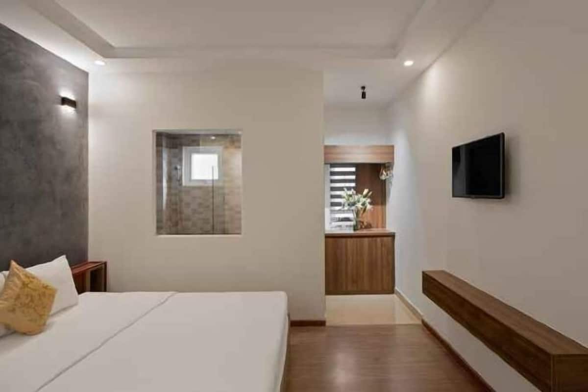 Camas con pillow-top, minibar, decoración personalizada y escritorio