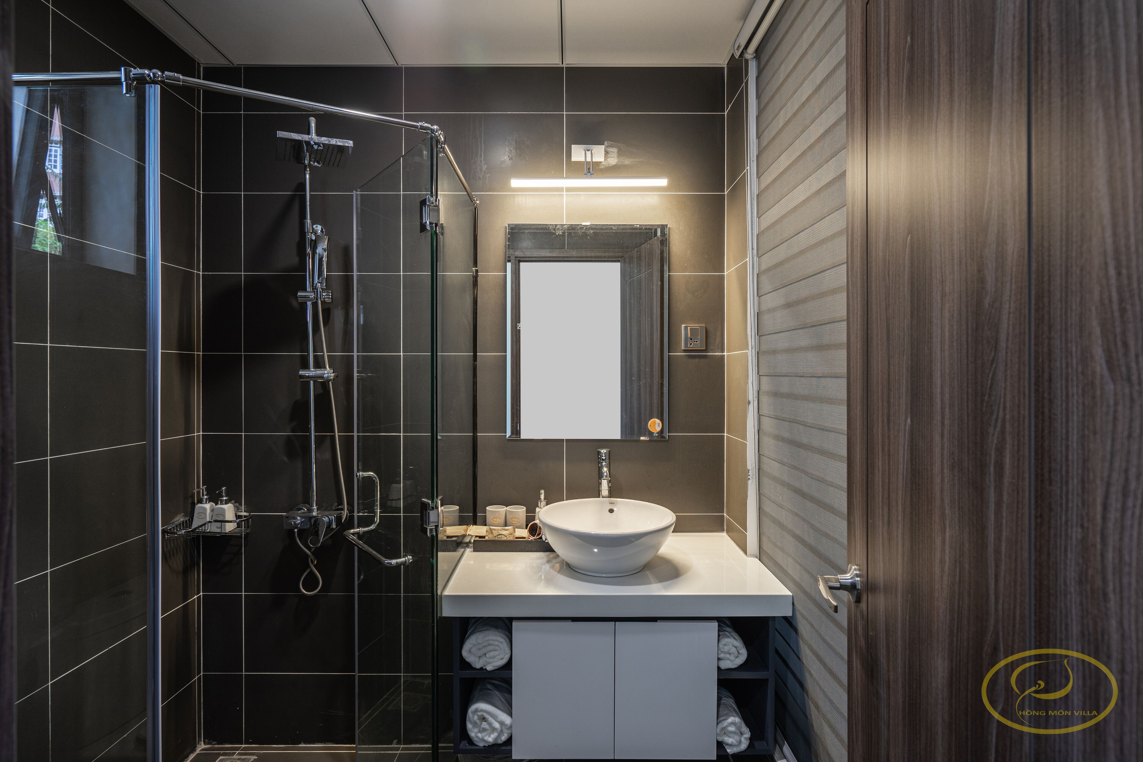 rainfall showerhead, designer toiletries, hair dryer, slippers