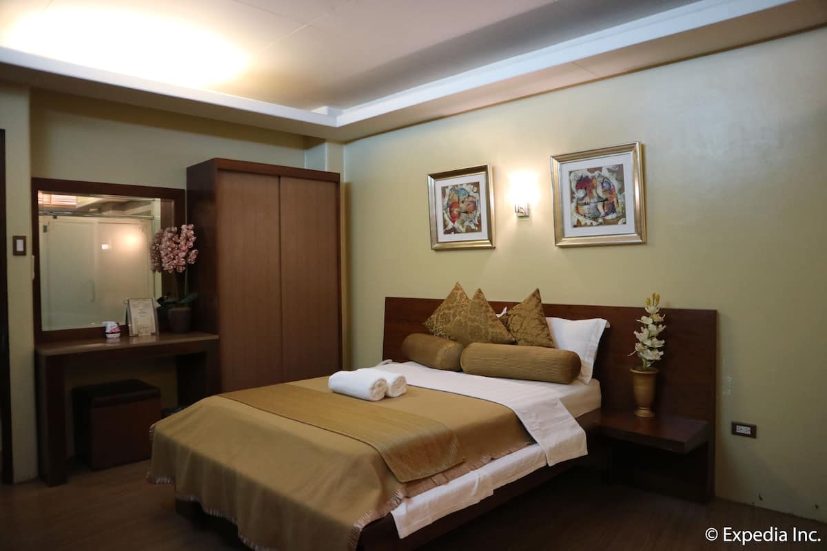 Deluxe suite, bubbelbad | 1 slaapkamer, een minibar, een bureau