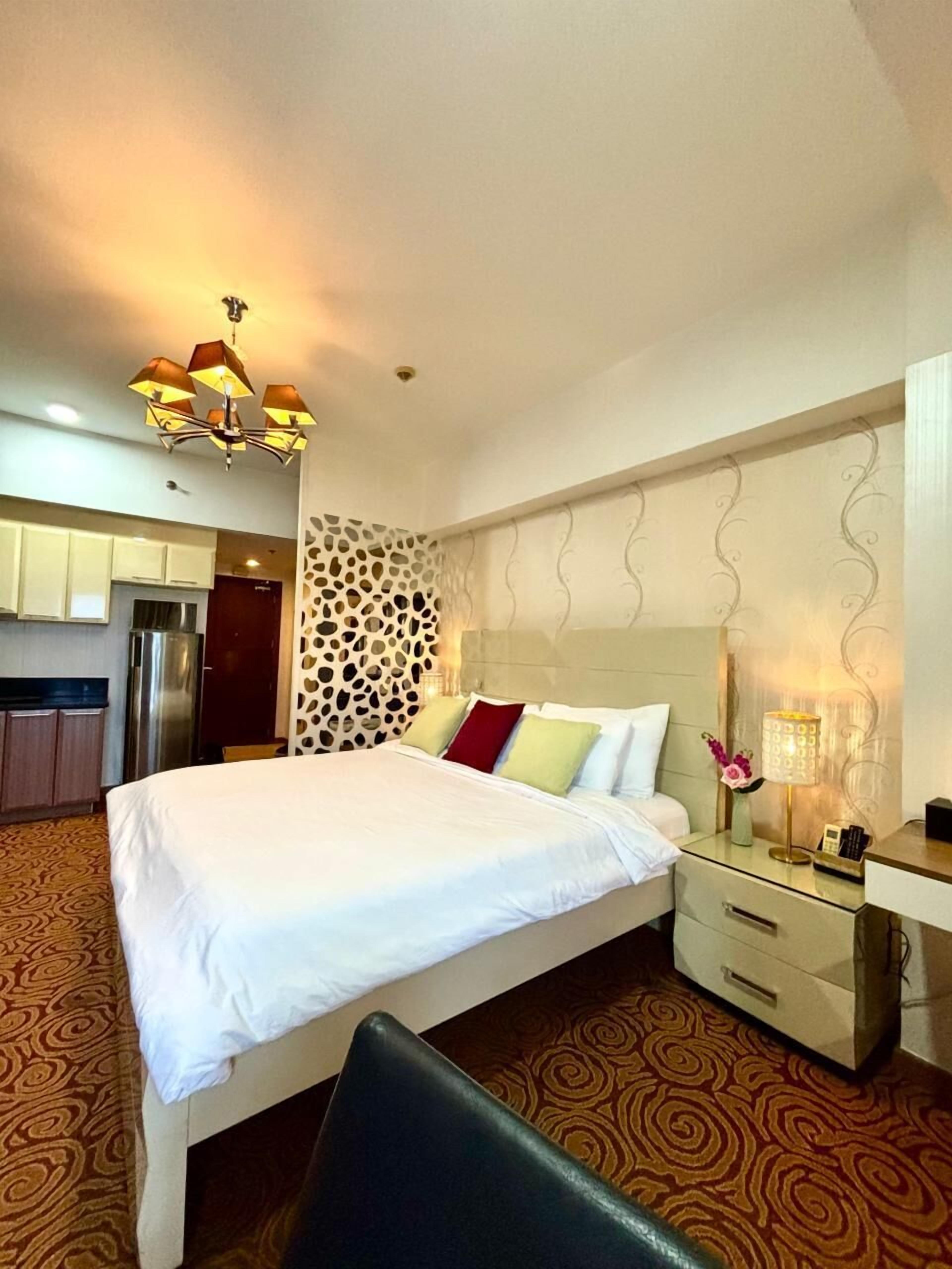 Premium bedding, down comforters, pillowtop beds, in-room safe