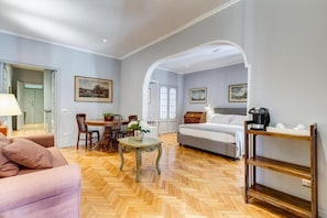 Suite Deluxe, cocina, torre | Sábanas italianas Frette, ropa de cama de alta calidad y edredón