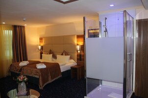 Ropa de cama de alta calidad y minibar 