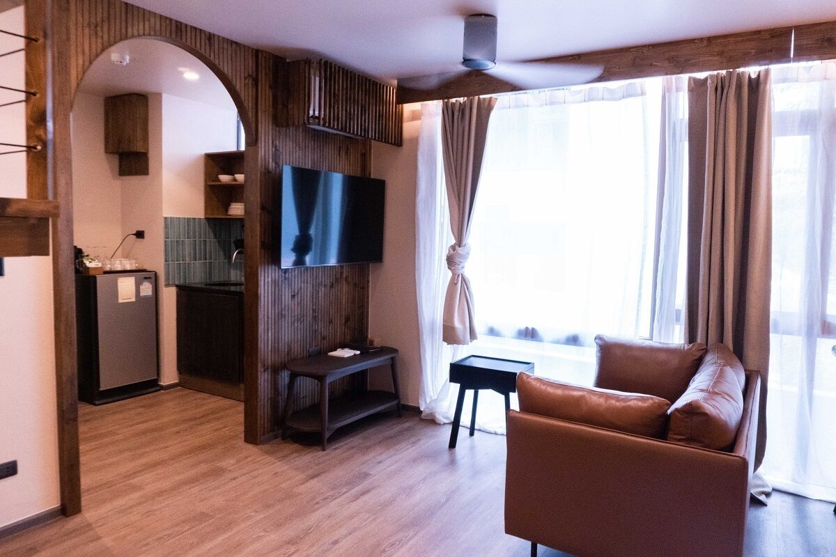 family quadruple room, 1 bedroom, refrigerator & microwave, city view | 1 bedroom, minibar, in-room safe, individually decorated