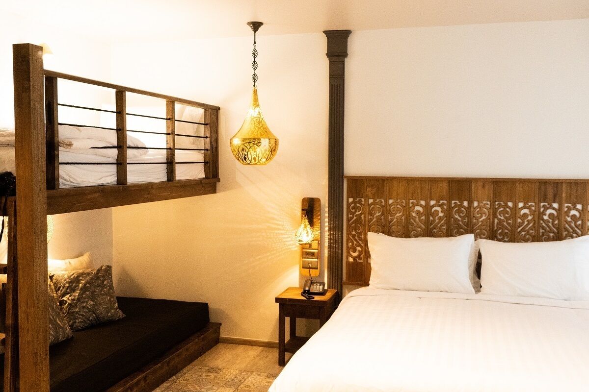 family quadruple room | 1 bedroom, minibar, in-room safe, individually decorated