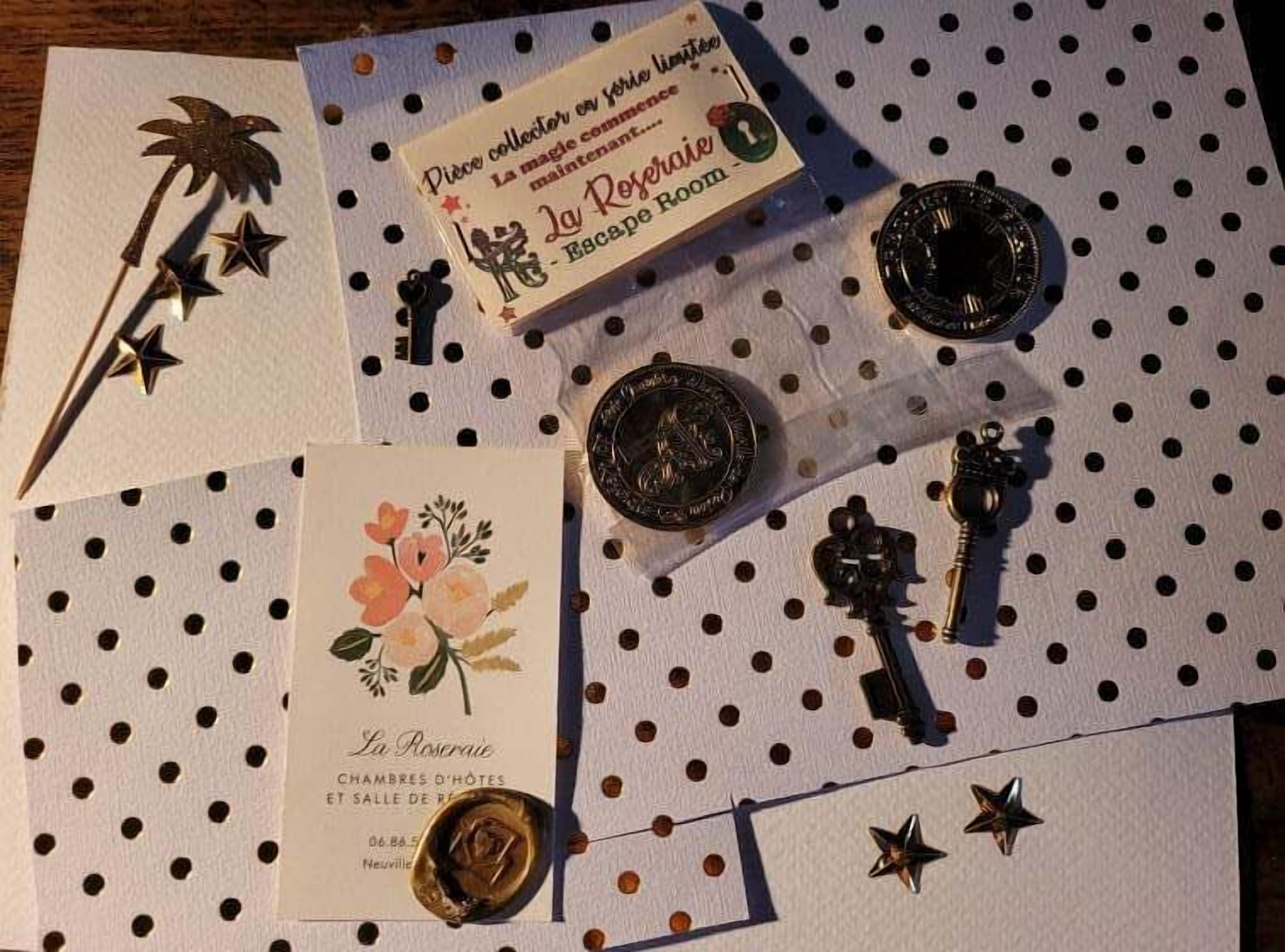 A hotel brochure titled "La Roseraie" with a polka dot tablecloth background.