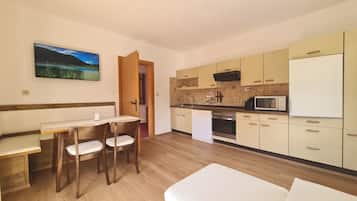 Standard Apartment, 2 Bedrooms, Lake View | Living area | Flat-screen TV