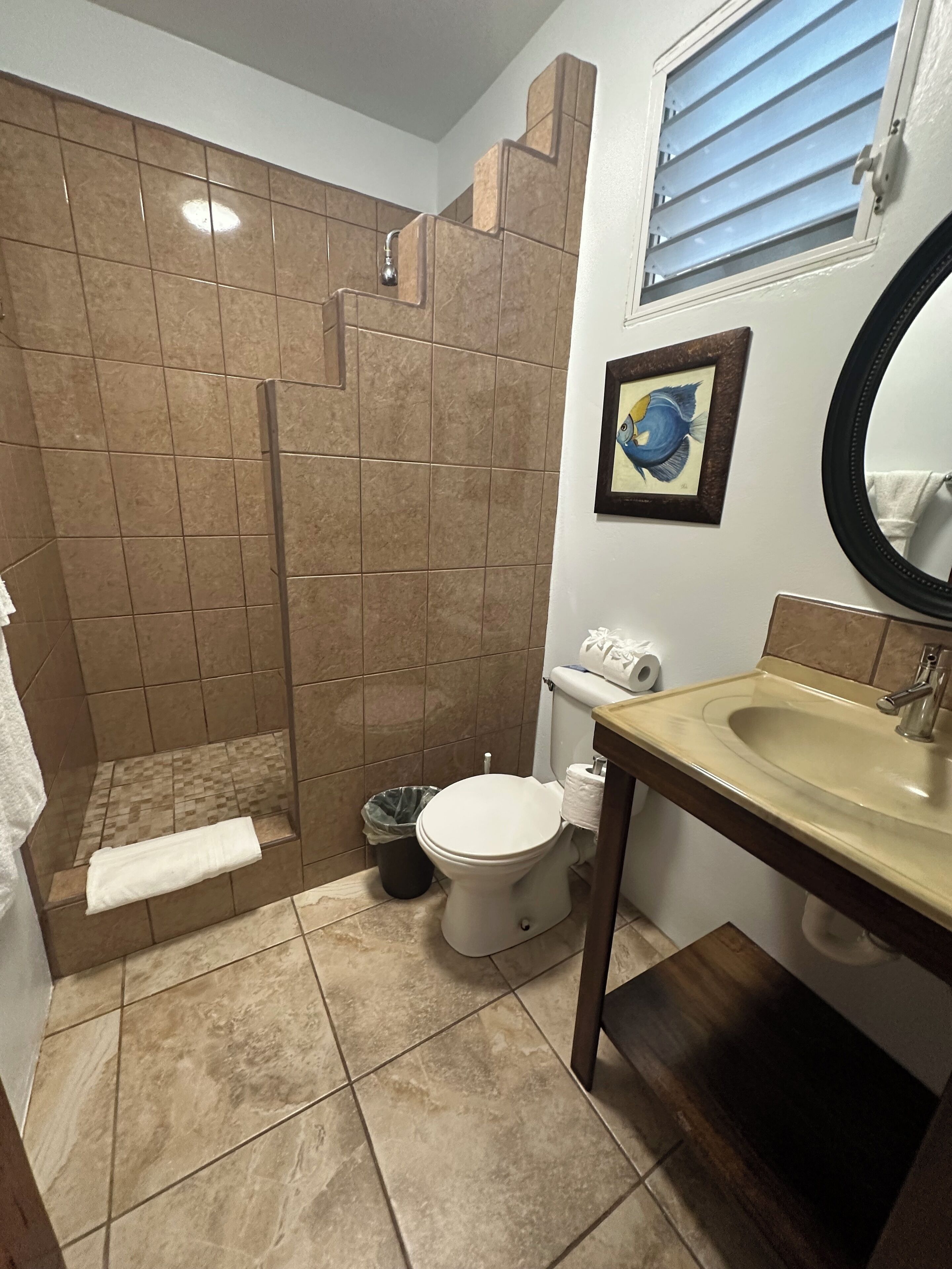 deluxe single room, 1 bedroom, refrigerator & microwave, sea view | bathroom | shower, free toiletries, hair dryer, towels