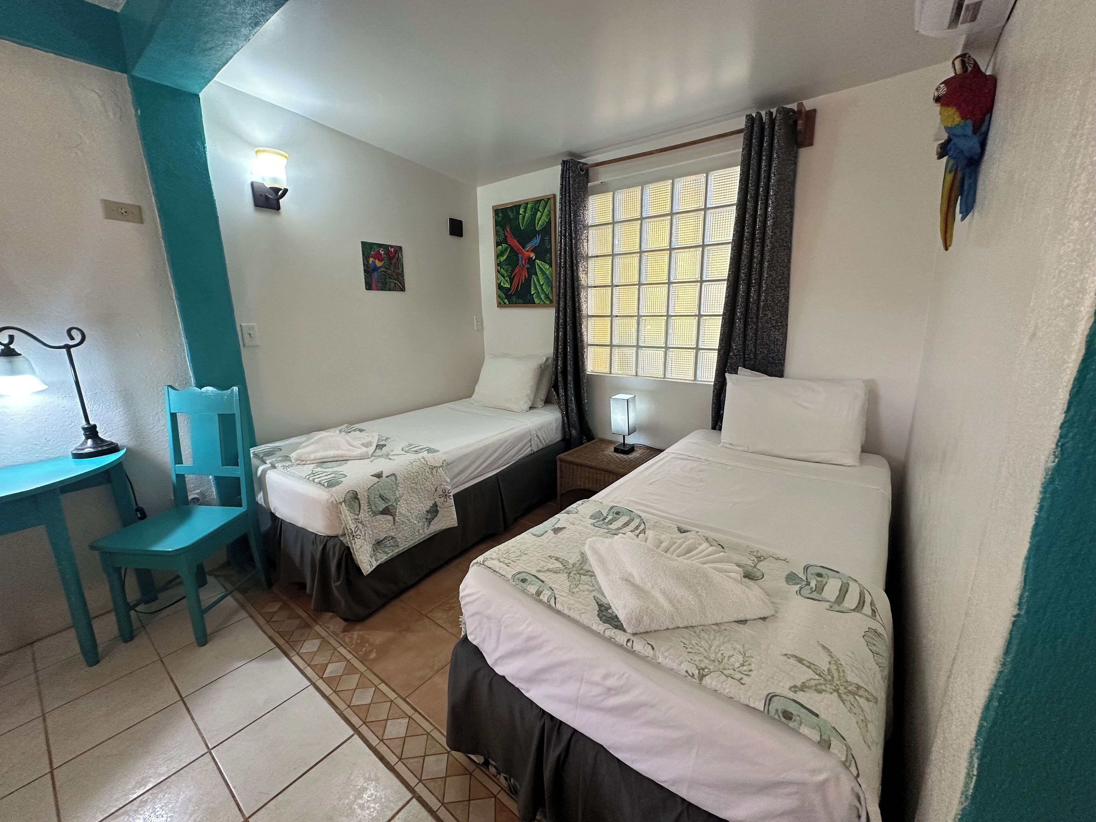 standard double or twin room, multiple beds, refrigerator, courtyard view | 1 bedroom, individually decorated, individually furnished