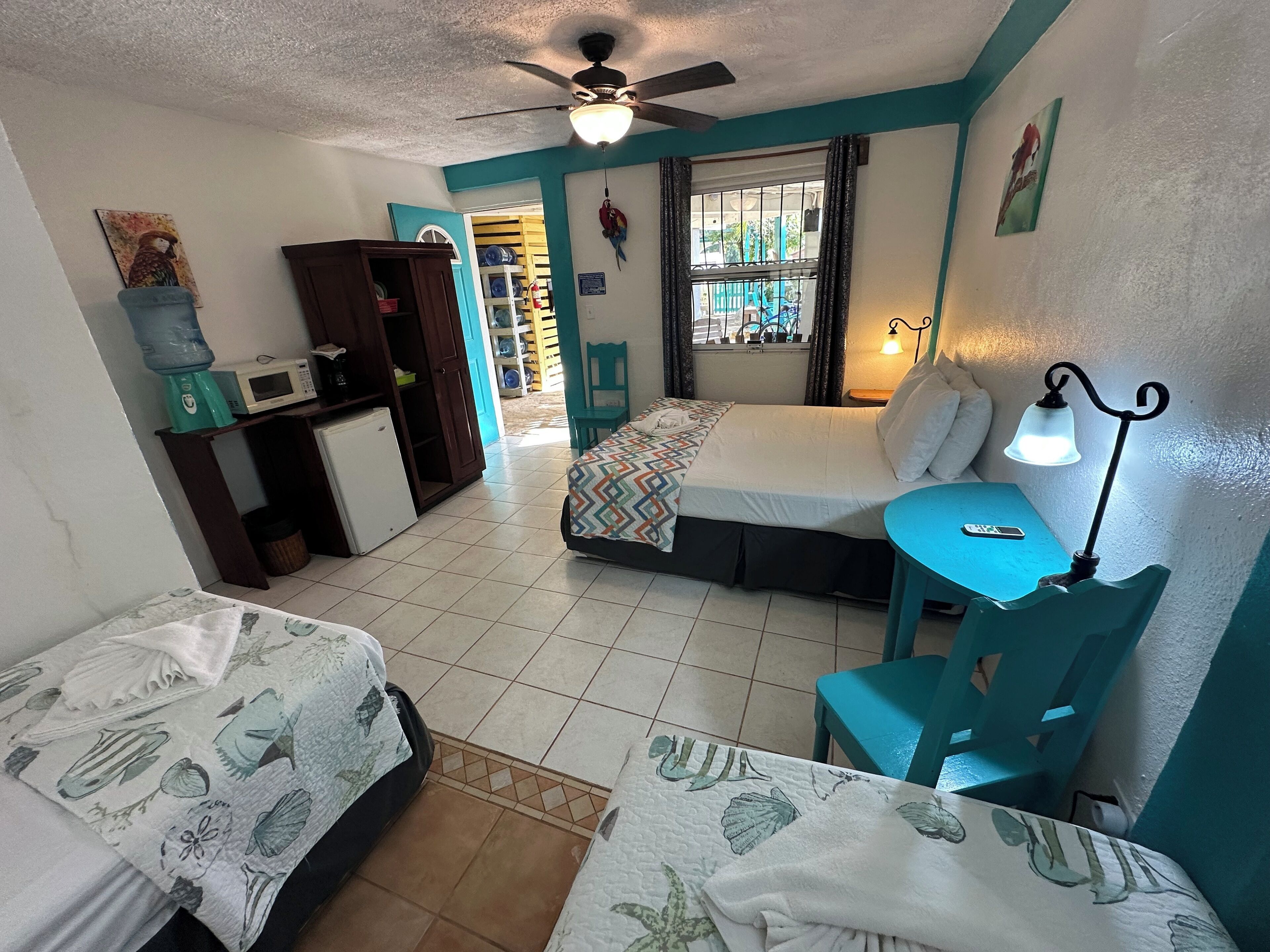 standard double or twin room, multiple beds, refrigerator, courtyard view | 1 bedroom, individually decorated, individually furnished