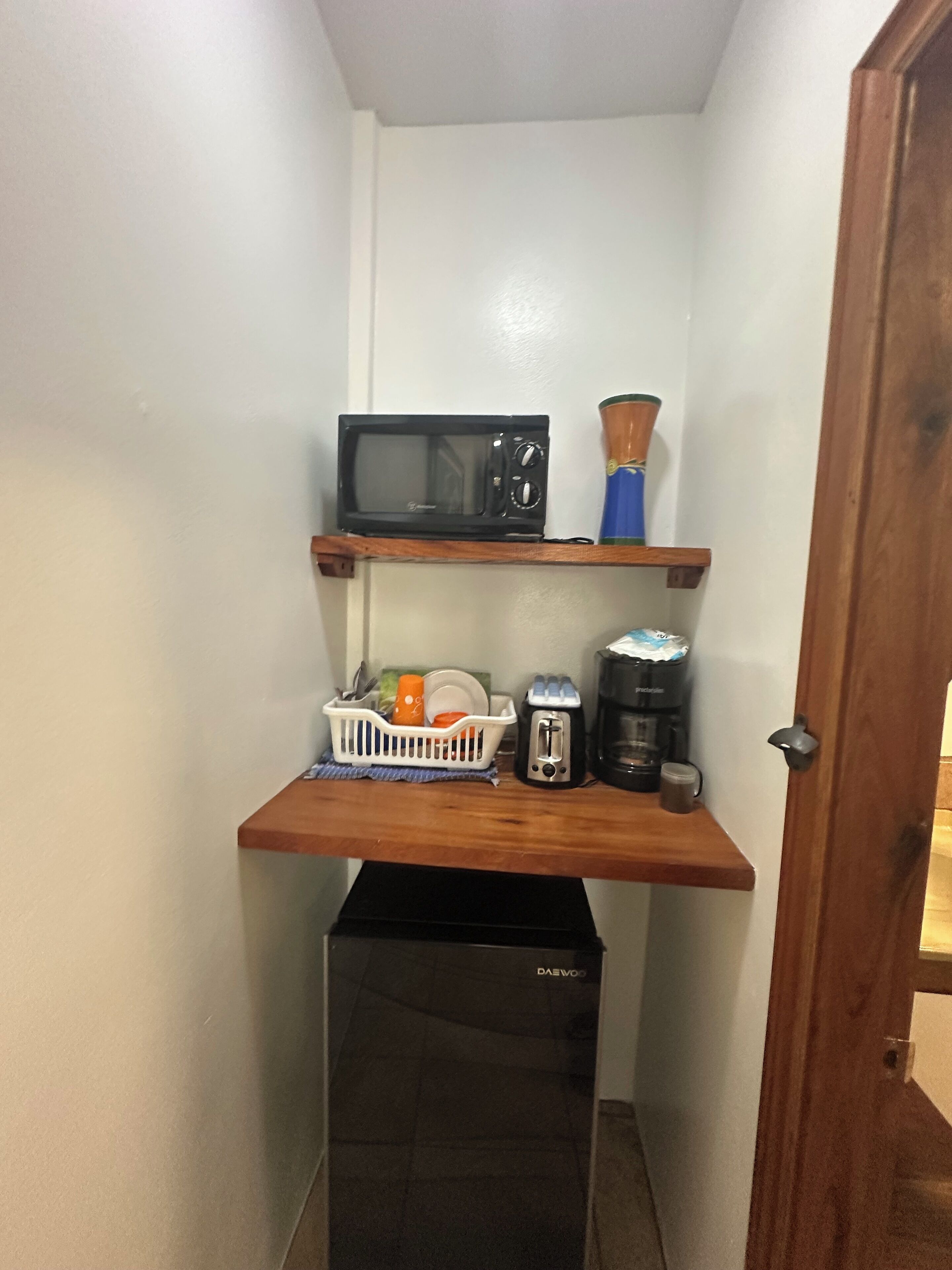 deluxe room, 1 bedroom, refrigerator & microwave, sea view | private kitchen | fridge, coffee/tea maker, freezer