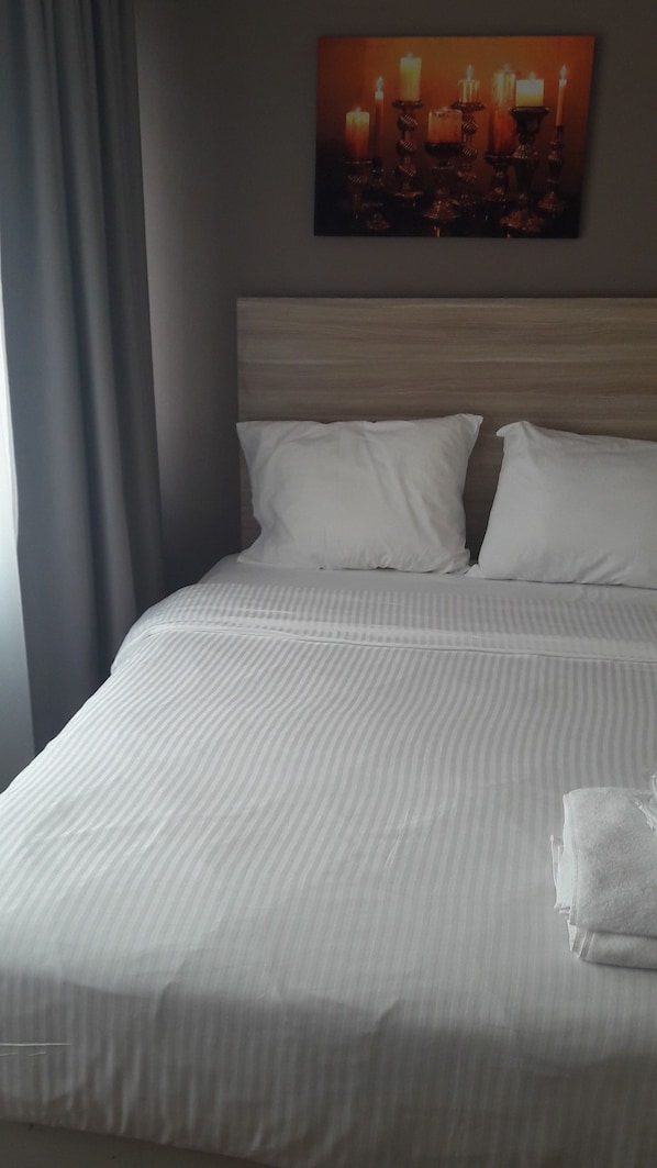 Chambre Standard, fumeur | Literie de qualité, rideaux d’obscurcissement, fer et planche à repasser