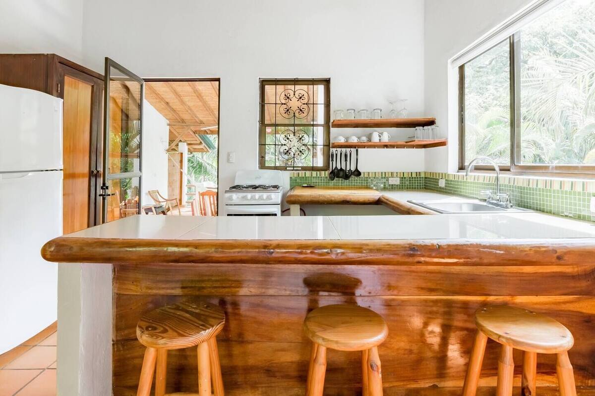 full-sized fridge, coffee/tea maker, electric kettle, dining tables