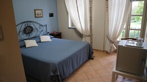 Habitació doble clàssica | Minibar, caixa forta a l'habitació, wifi gratuïta i roba de llit 