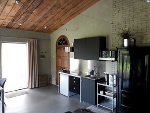 Panorama-studiolejlighed - 1 queensize-seng - udsigt til have (Framboos) | Privat køkken | Køleskab, mikrobølgeovn, ovn, kogeplade