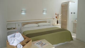 Habitación estándar, 1 cama King size | Escritorio, camas extra, wifi gratis y ropa de cama