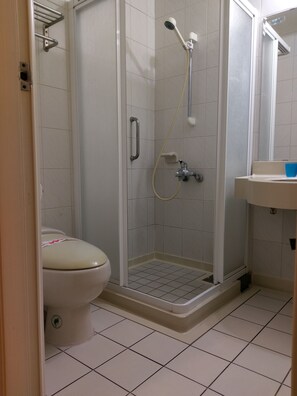 Shower, free toiletries, hair dryer, slippers