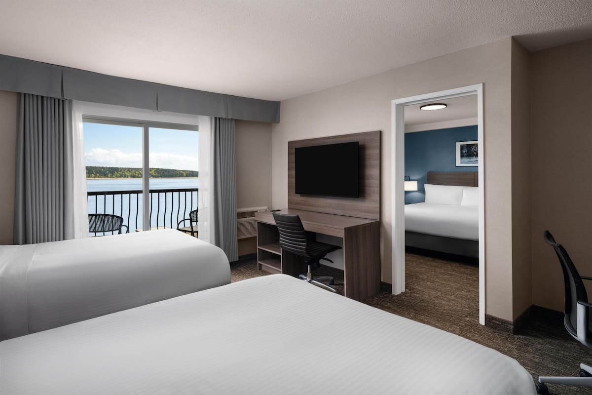 Family Suite, Multiple Beds, Balcony, Ocean View | Iron/ironing board, free WiFi, bed sheets