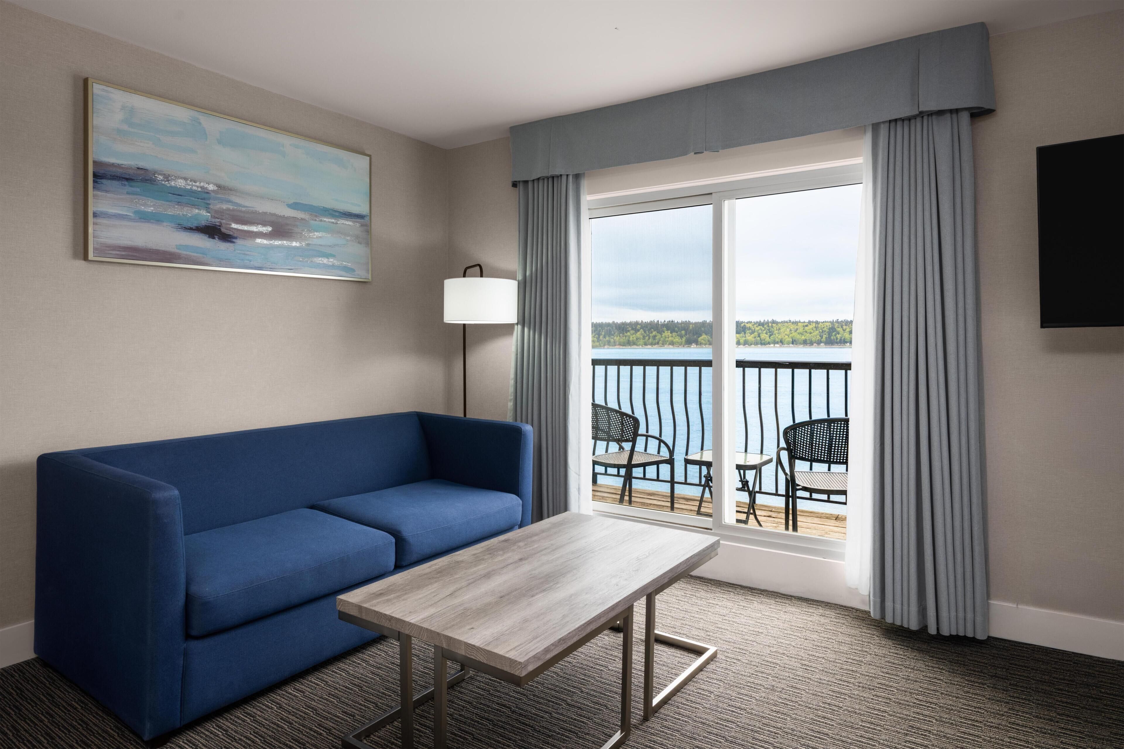 Suite, 1 King Bed, Balcony, Ocean View | Iron/ironing board, free WiFi, bed sheets