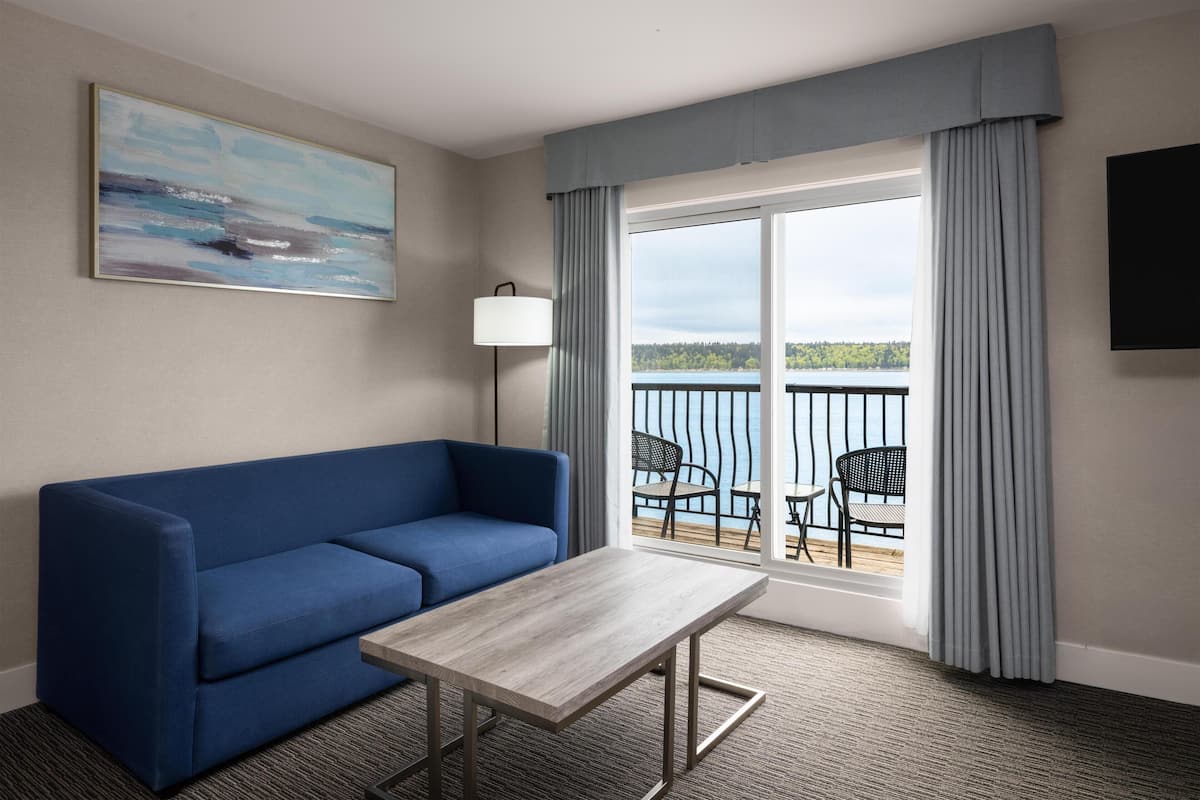 Suite, 1 King Bed, Balcony, Ocean View | Iron/ironing board, free WiFi, bed sheets