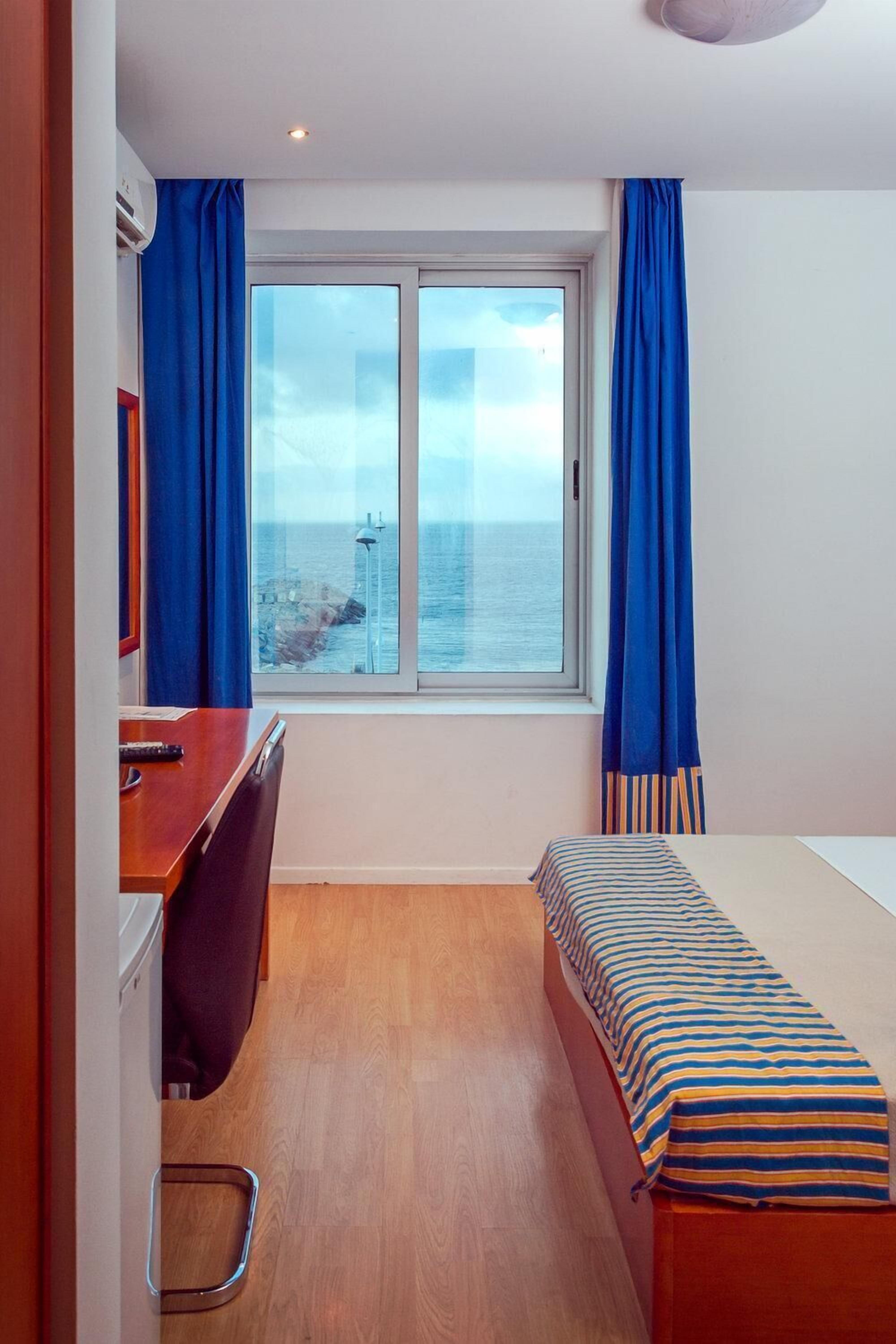 in-room safe, individually decorated, desk, blackout curtains