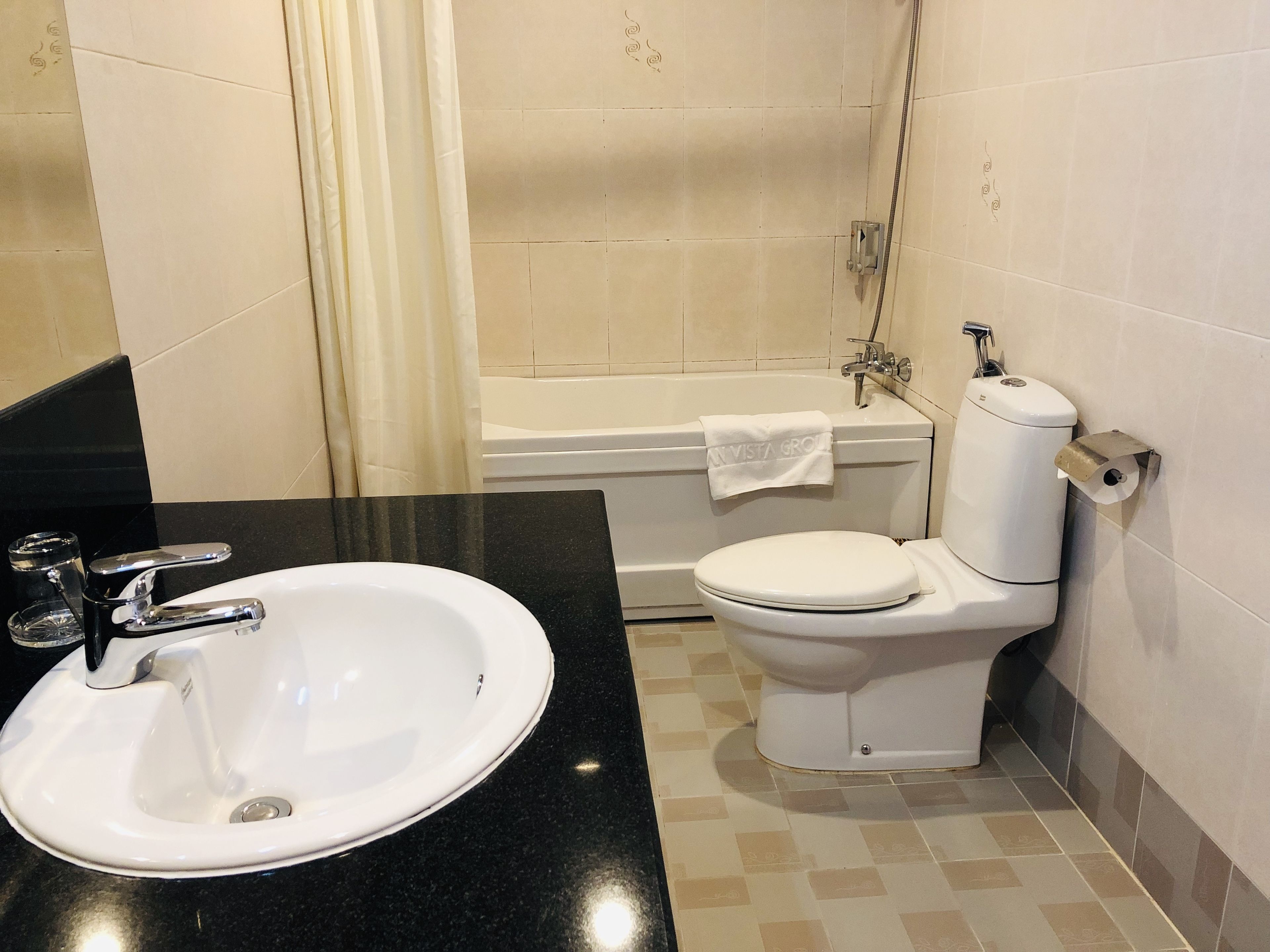 club suite | bathroom | free toiletries, hair dryer, slippers, towels