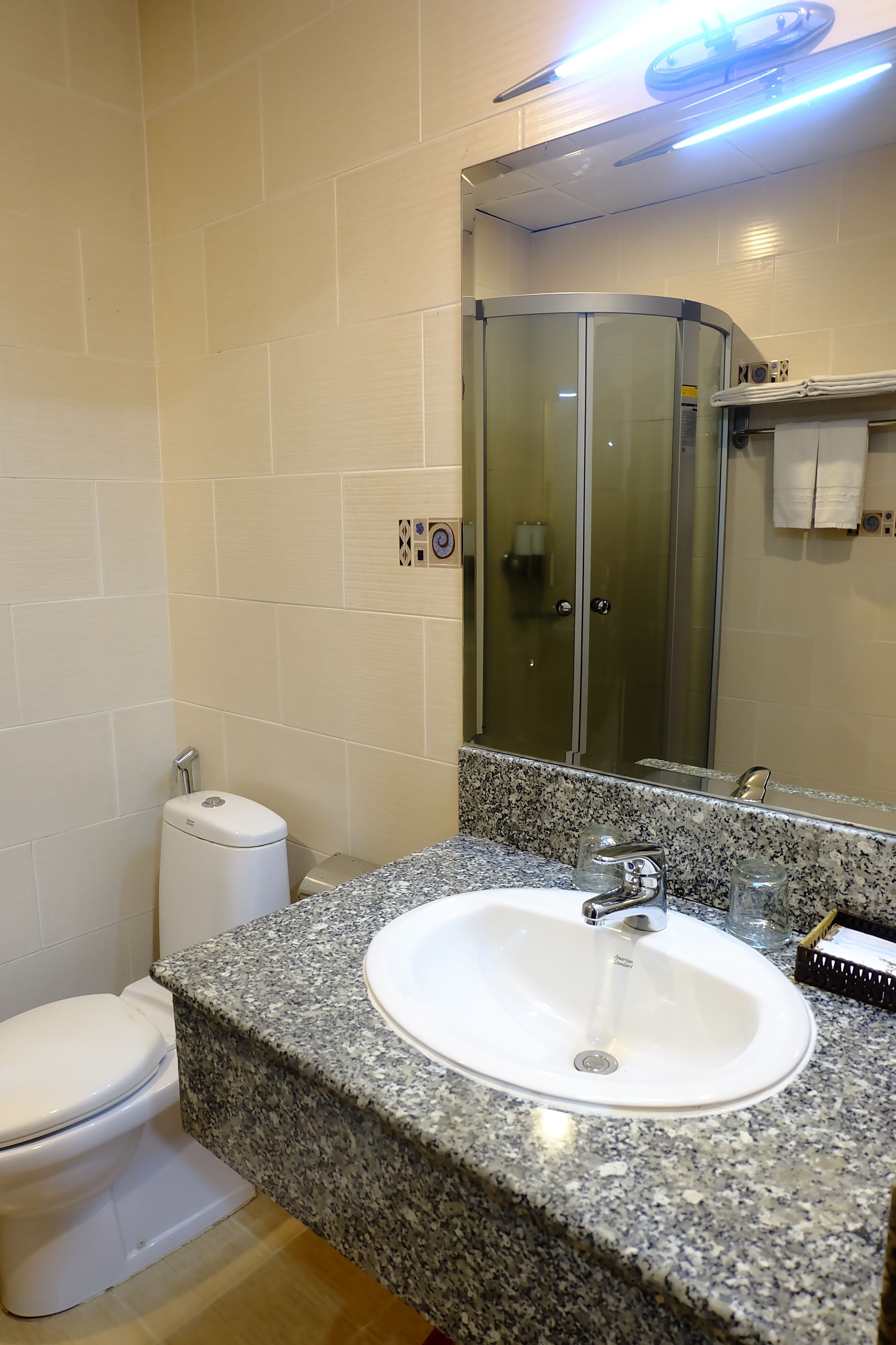 triple room with window | bathroom | free toiletries, hair dryer, slippers, towels