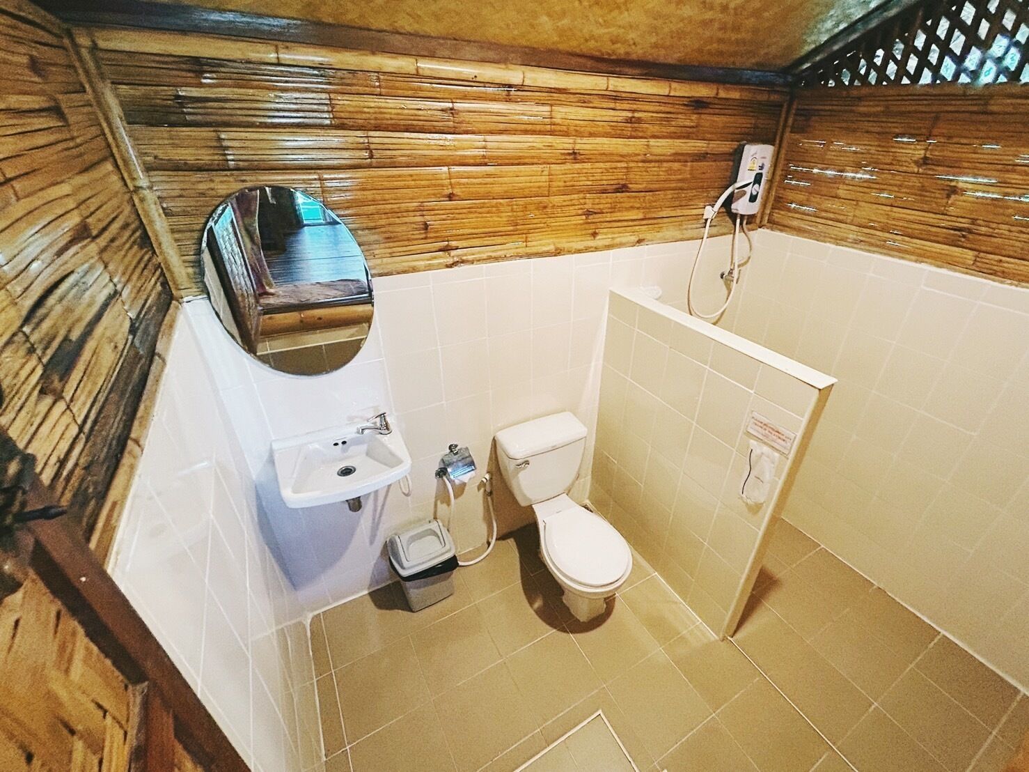 bamboo cottage with air condition | bathroom | rainfall showerhead, hair dryer, towels, soap