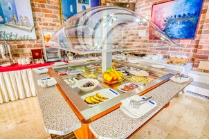Daily buffet breakfast (EUR 12 per person)