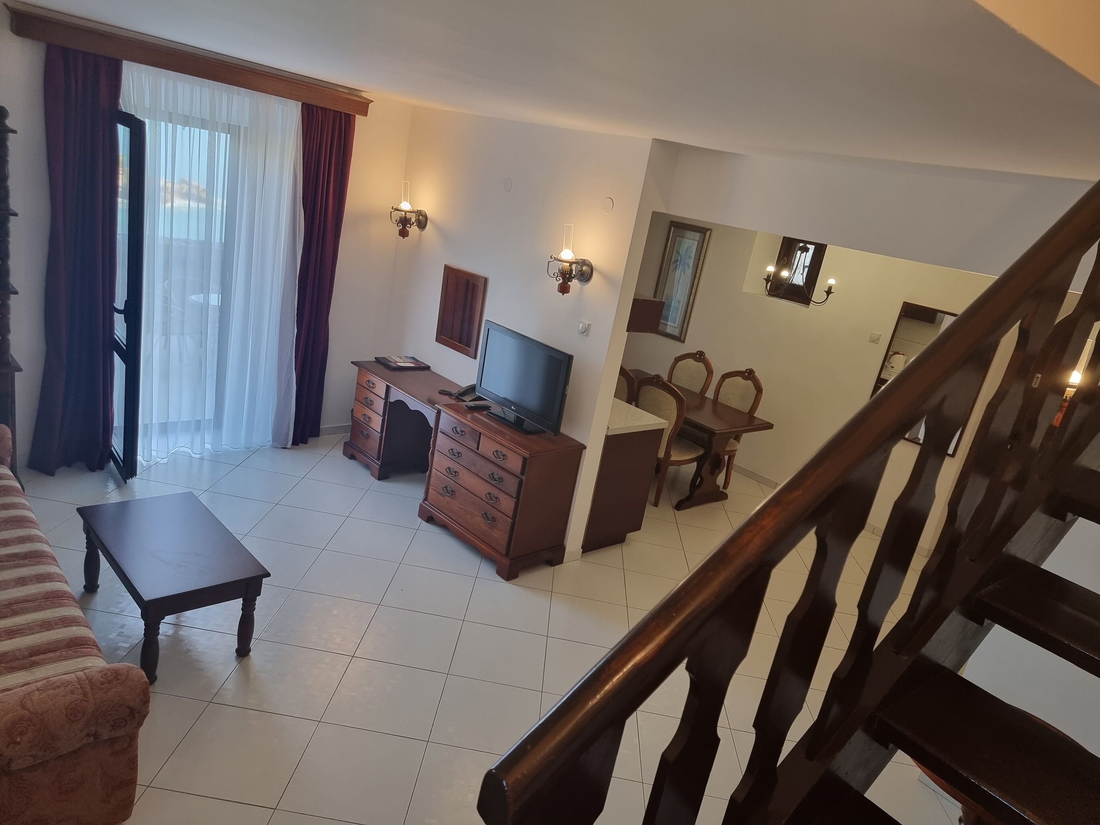 deluxe suite (duplex) with sea view / 2 bedrooms, terrace | living area | 32-inch tv with cable channels