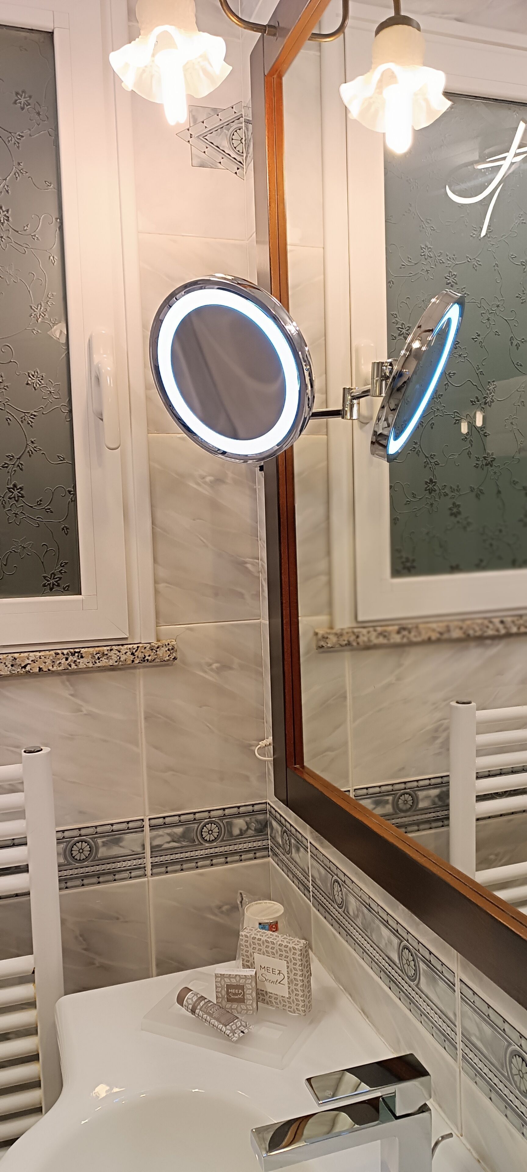 luxury suite | bathroom | designer toiletries, hair dryer, slippers, bidet