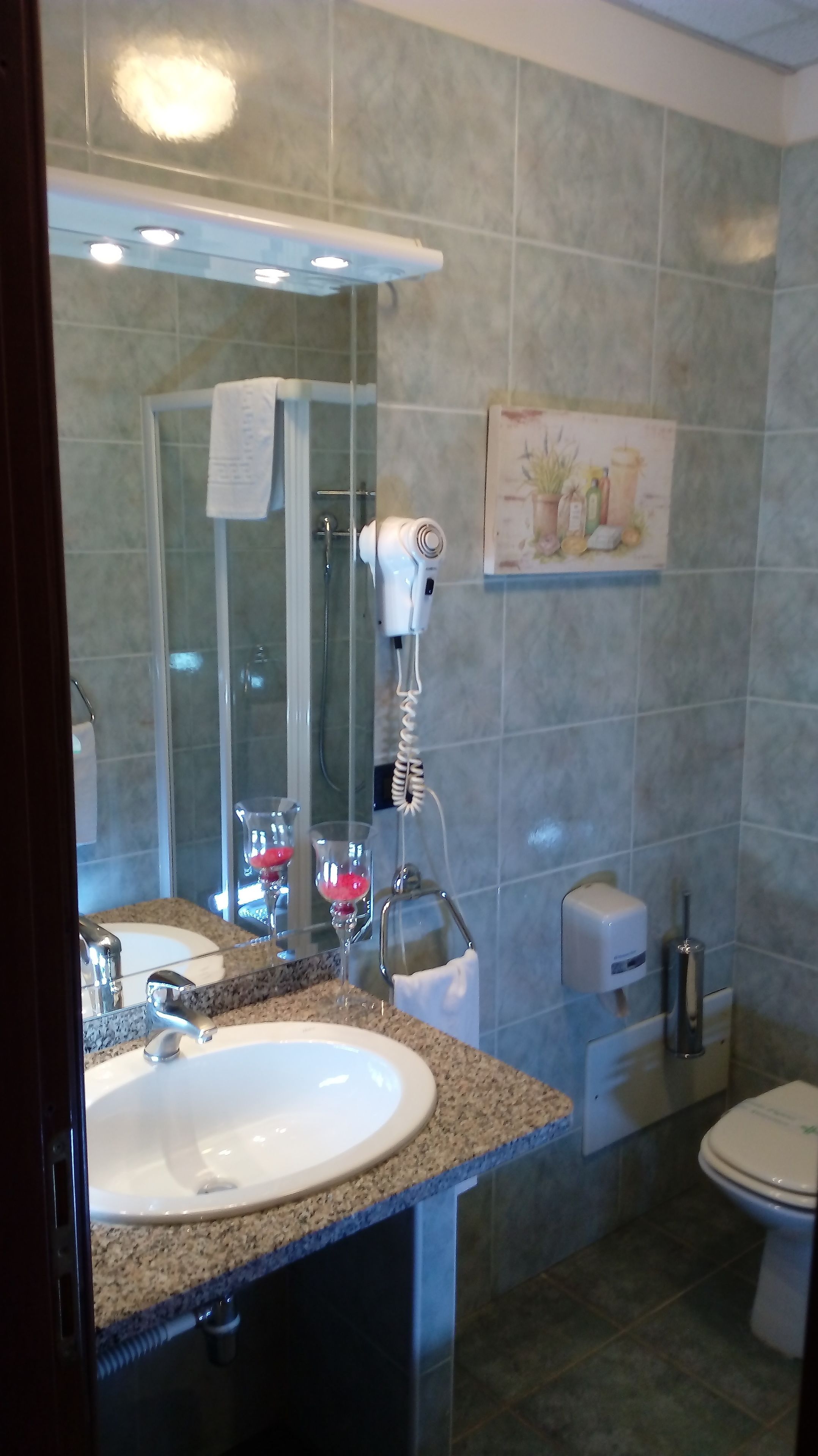 quadruple room | bathroom | designer toiletries, hair dryer, slippers, bidet