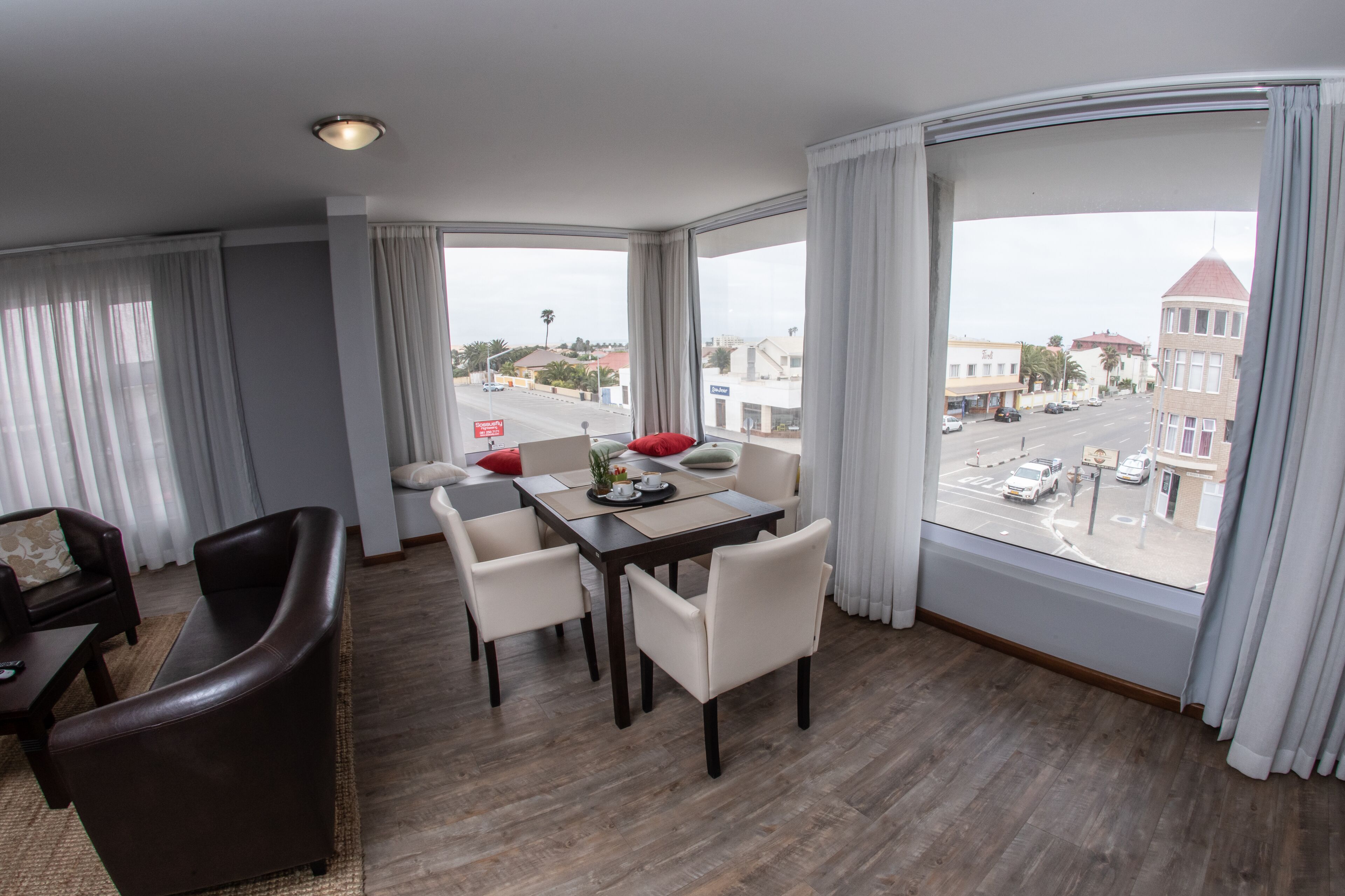 suite | living area | flat-screen tv