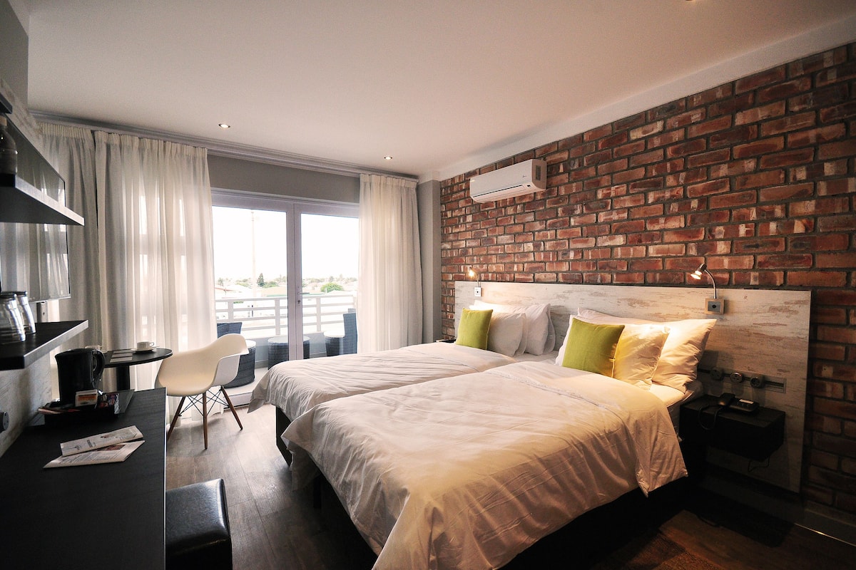 comfort twin room | minibar, in-room safe, desk, blackout curtains