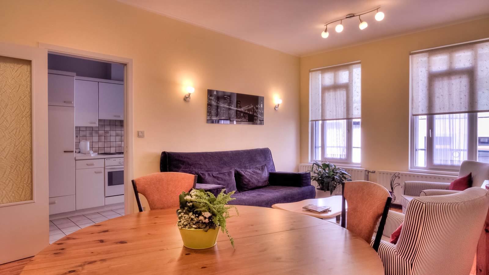 executive double room | living area | flat-screen tv