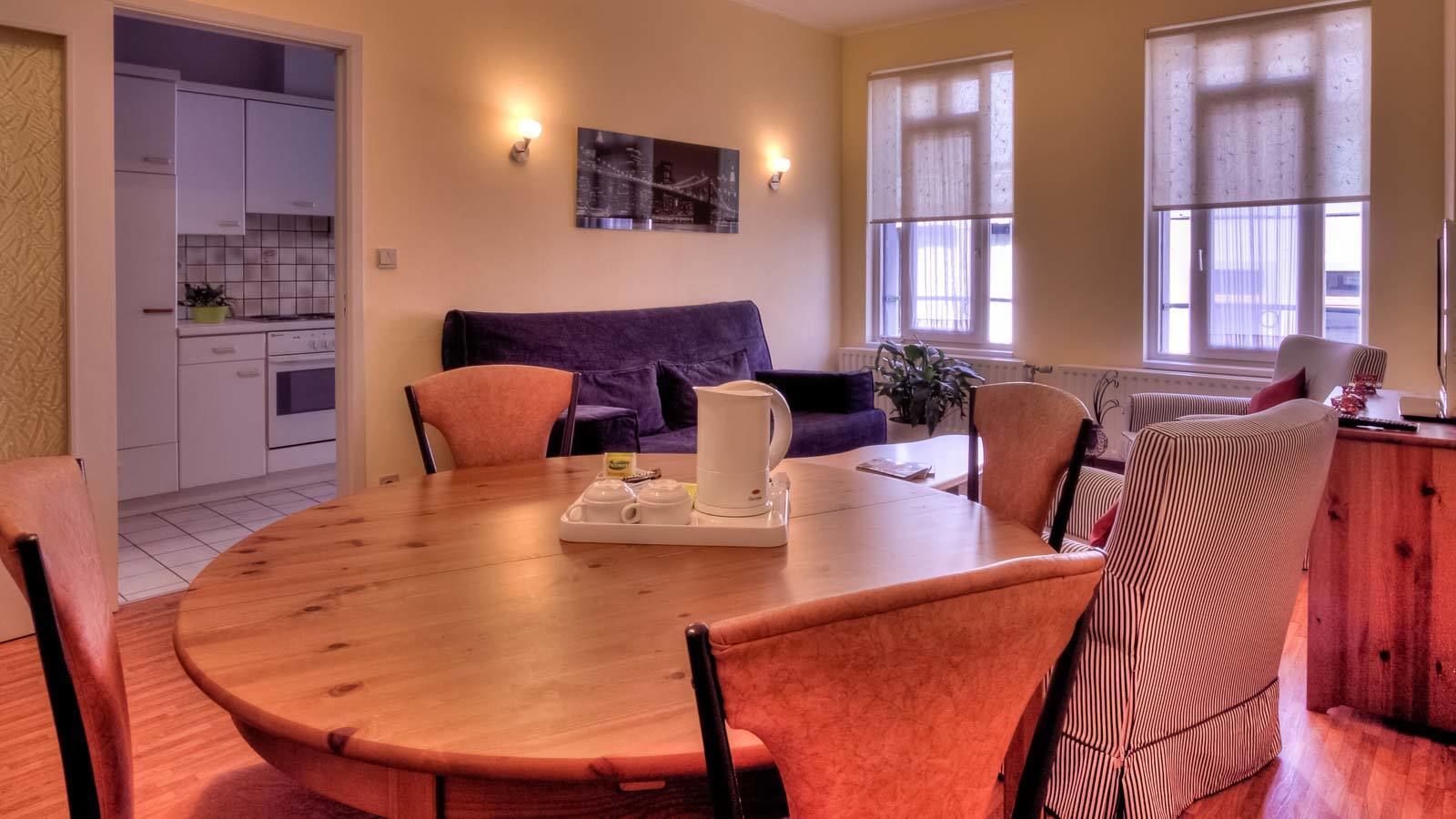 executive double room | living area | flat-screen tv