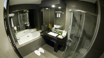 Combined shower/bathtub, deep-soaking bathtub, rainfall showerhead