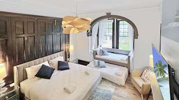 Heritage Family Room Shared Bathroom | Desk, laptop workspace, blackout drapes, iron/ironing board