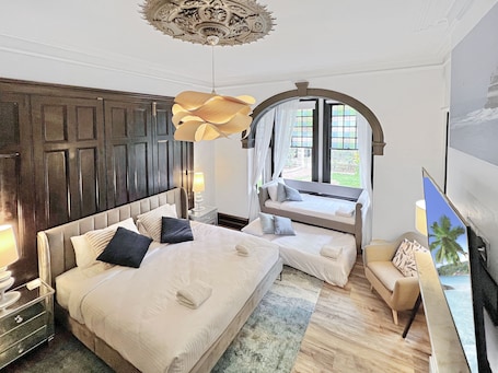 Heritage Family Room Shared Bathroom | Desk, laptop workspace, blackout drapes, iron/ironing board