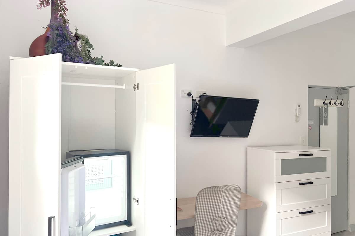 family room, shared bathroom | 1 bedroom, desk, laptop workspace, blackout curtains